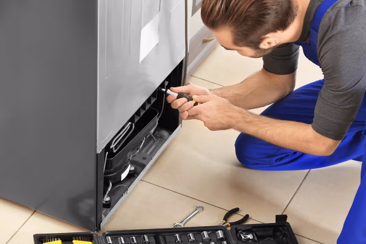 Featured Blog: A woman looking at a dishwasher