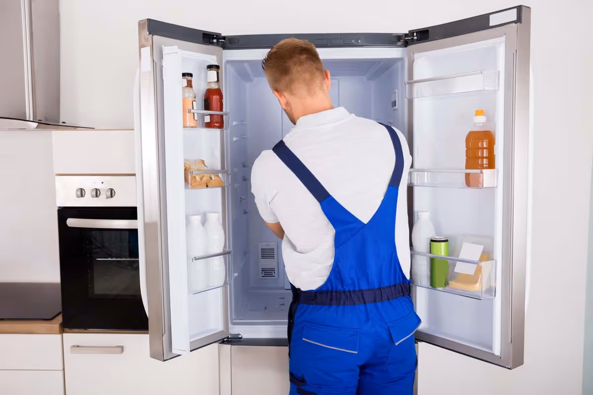 Featured Blog: A woman looking at a dishwasher
