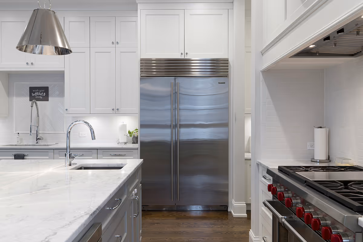 Featured Blog: A woman looking at a dishwasher
