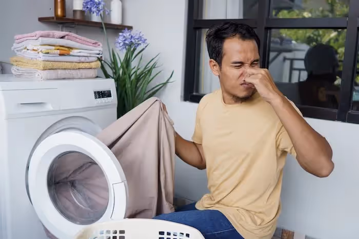 Featured Blog: A woman looking at a dishwasher