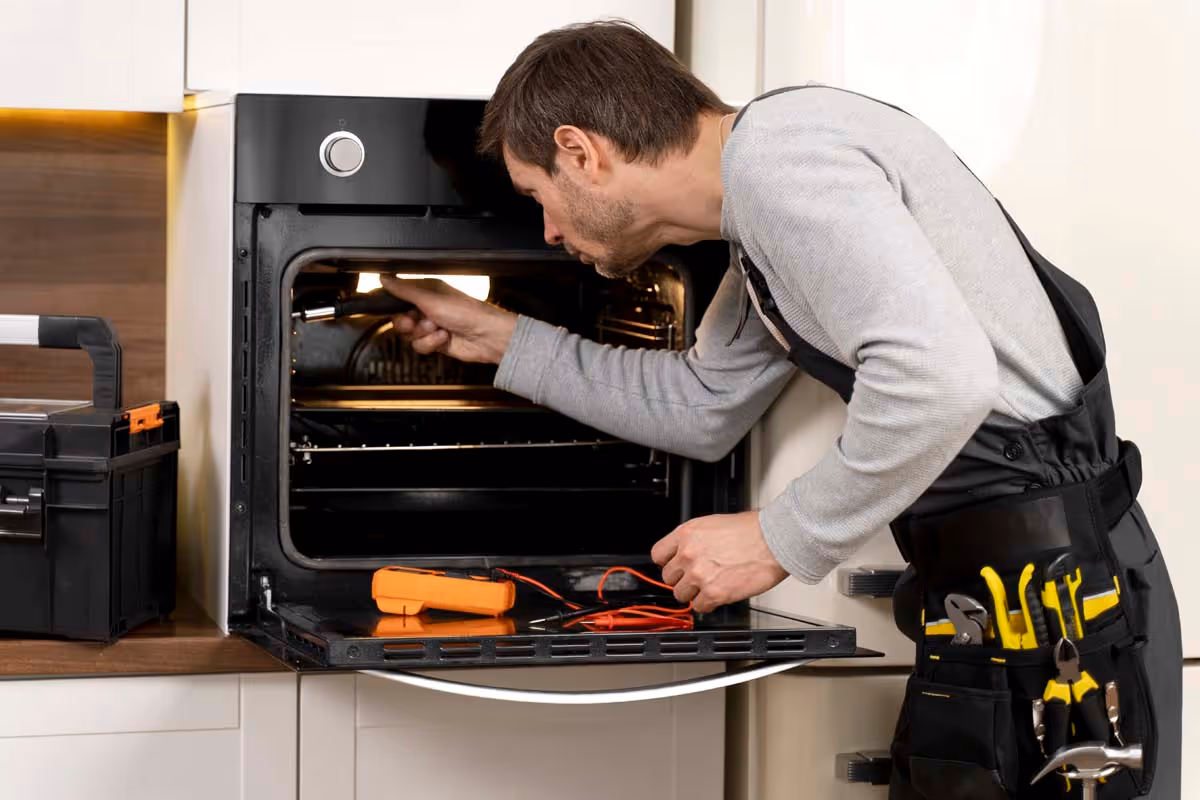Featured Blog: A woman looking at a dishwasher