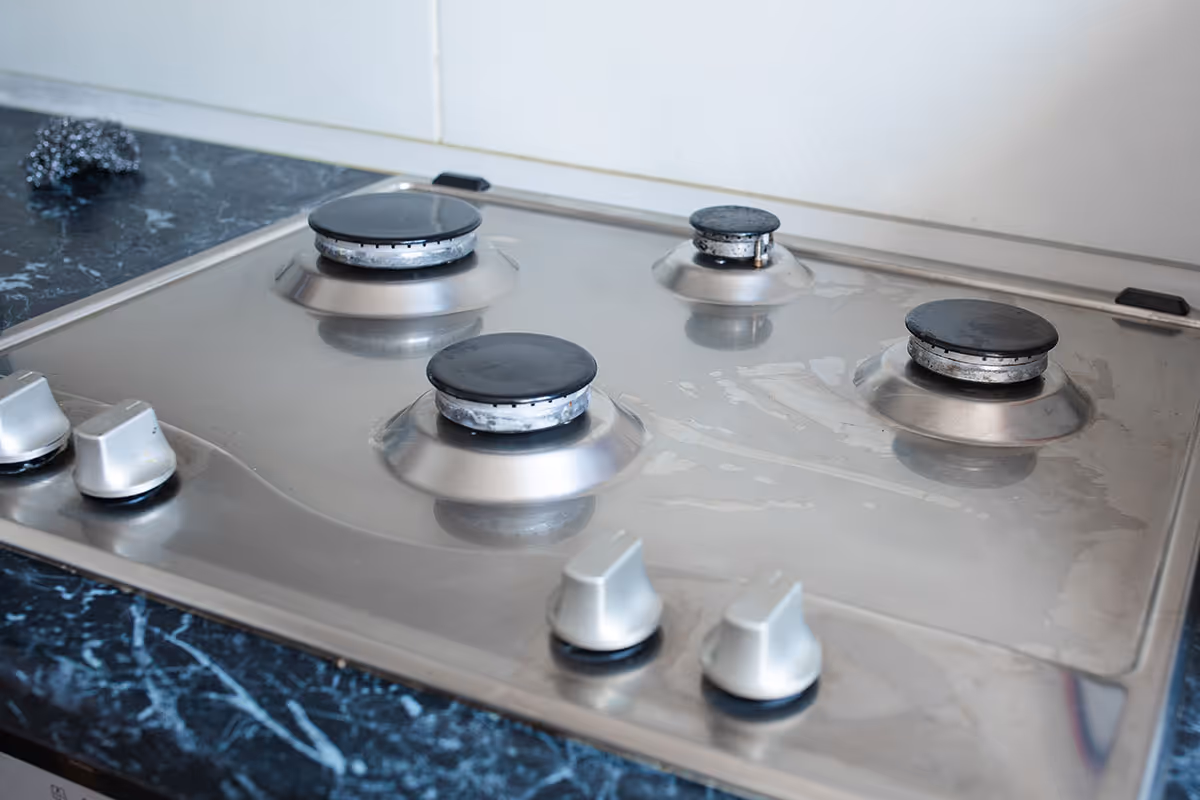 Featured Blog: A woman looking at a dishwasher