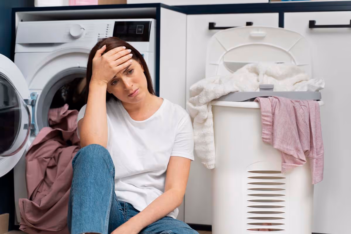 Featured Blog: A woman looking at a dishwasher