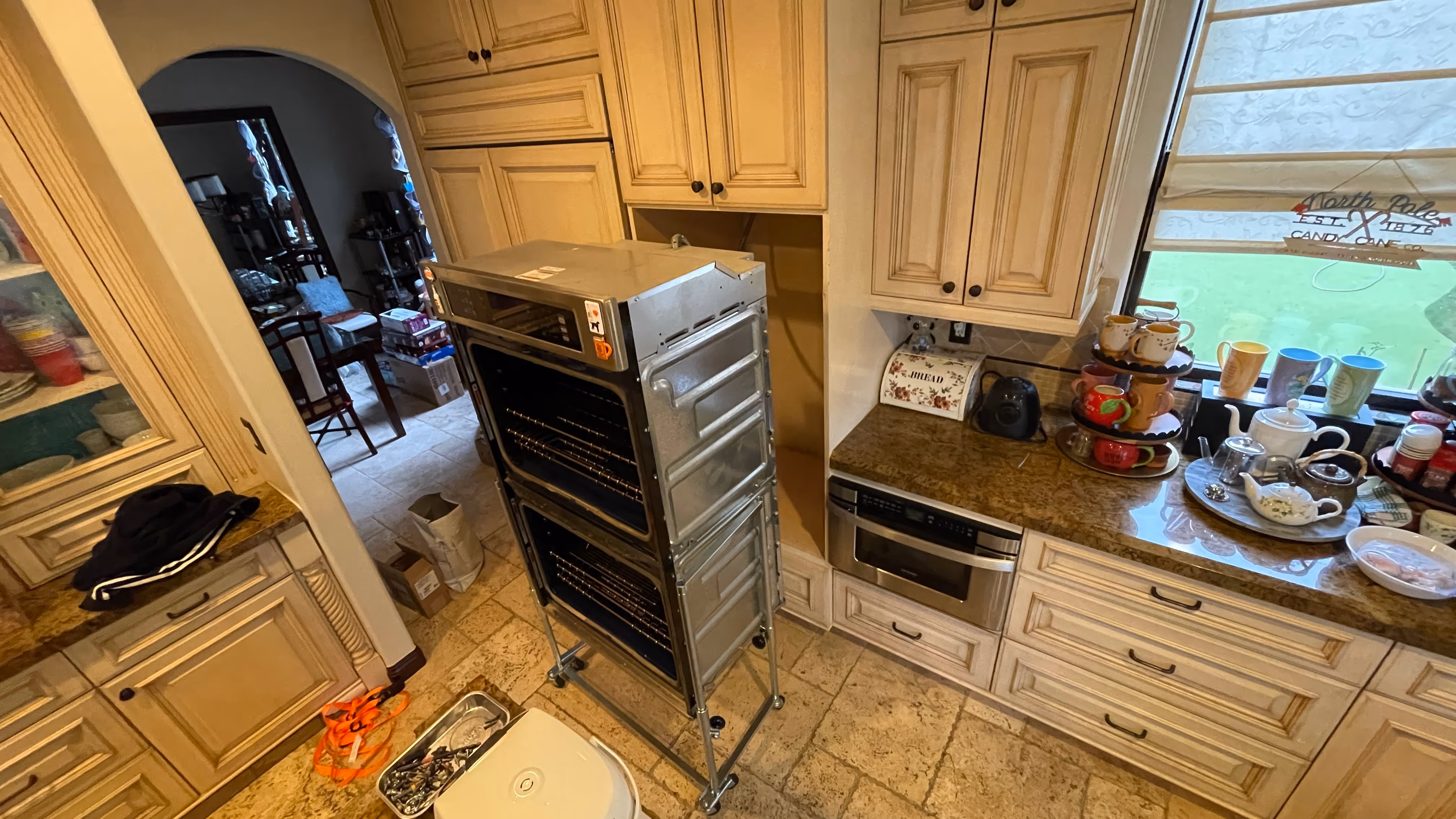 Featured Blog: A woman looking at a dishwasher