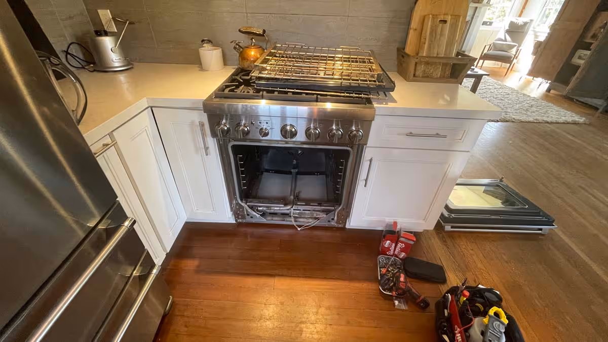 Featured Blog: A woman looking at a dishwasher