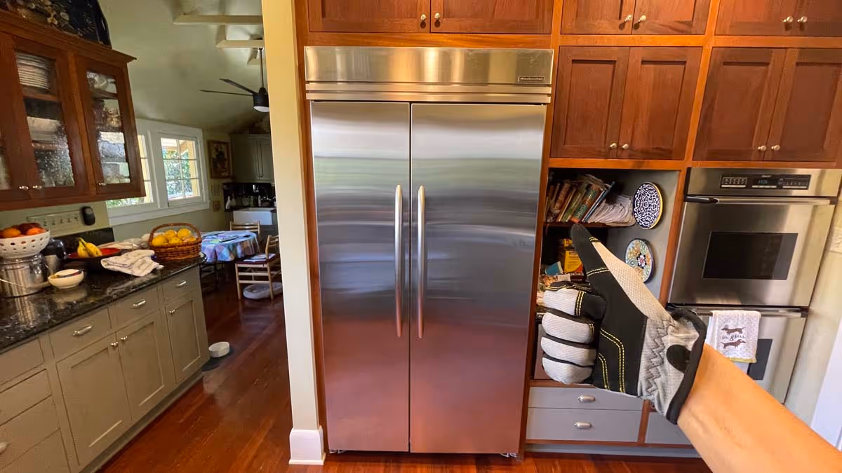 Featured Blog: A woman looking at a dishwasher