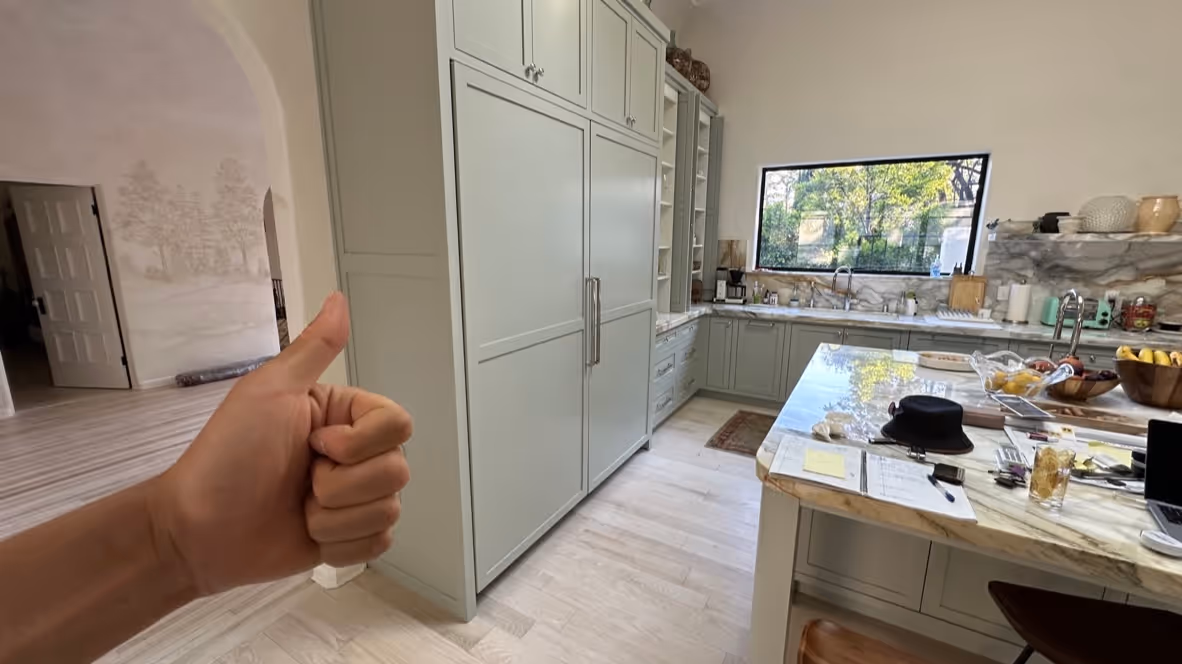 Featured Blog: A woman looking at a dishwasher