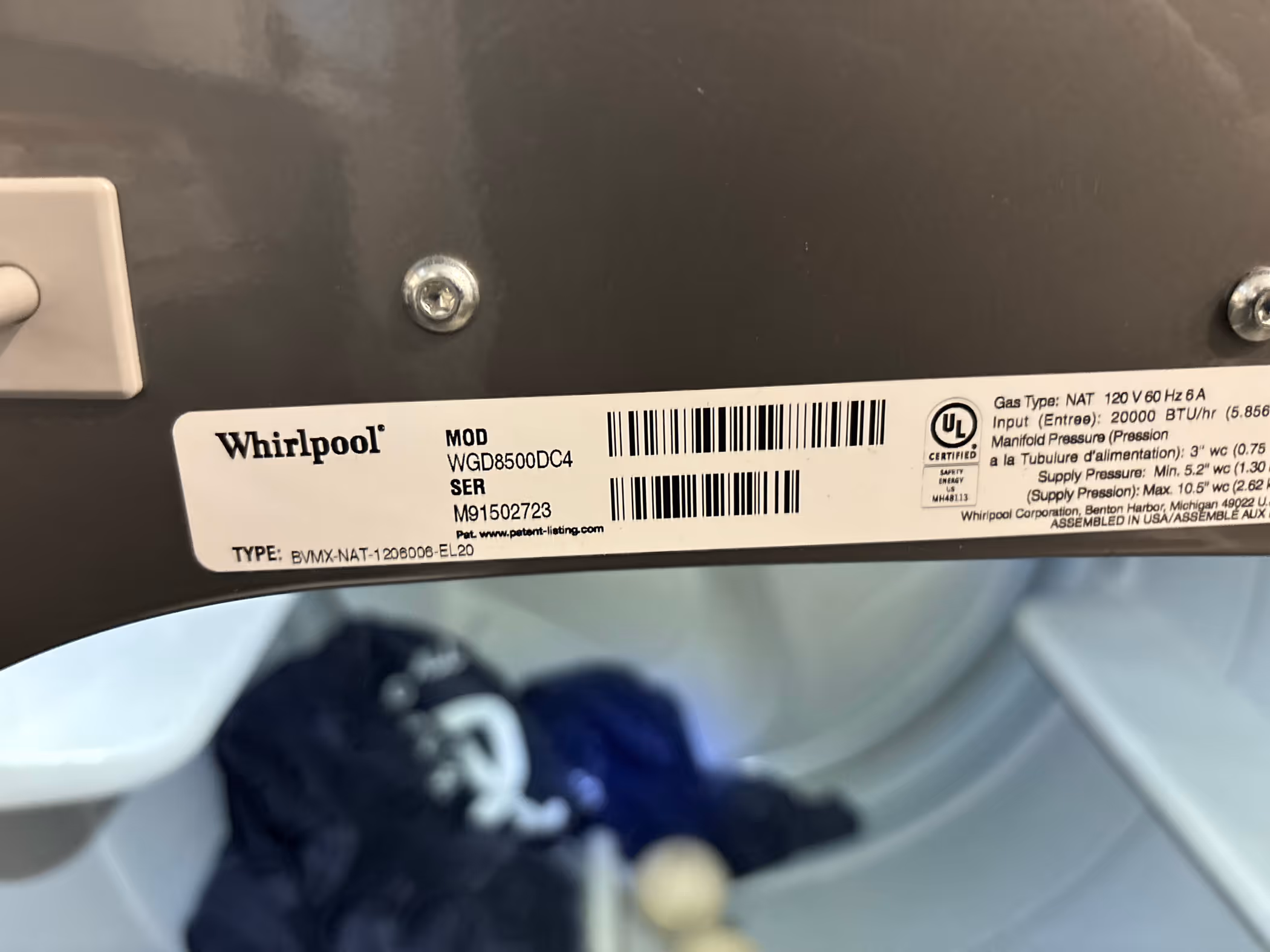 Featured Blog: A woman looking at a dishwasher