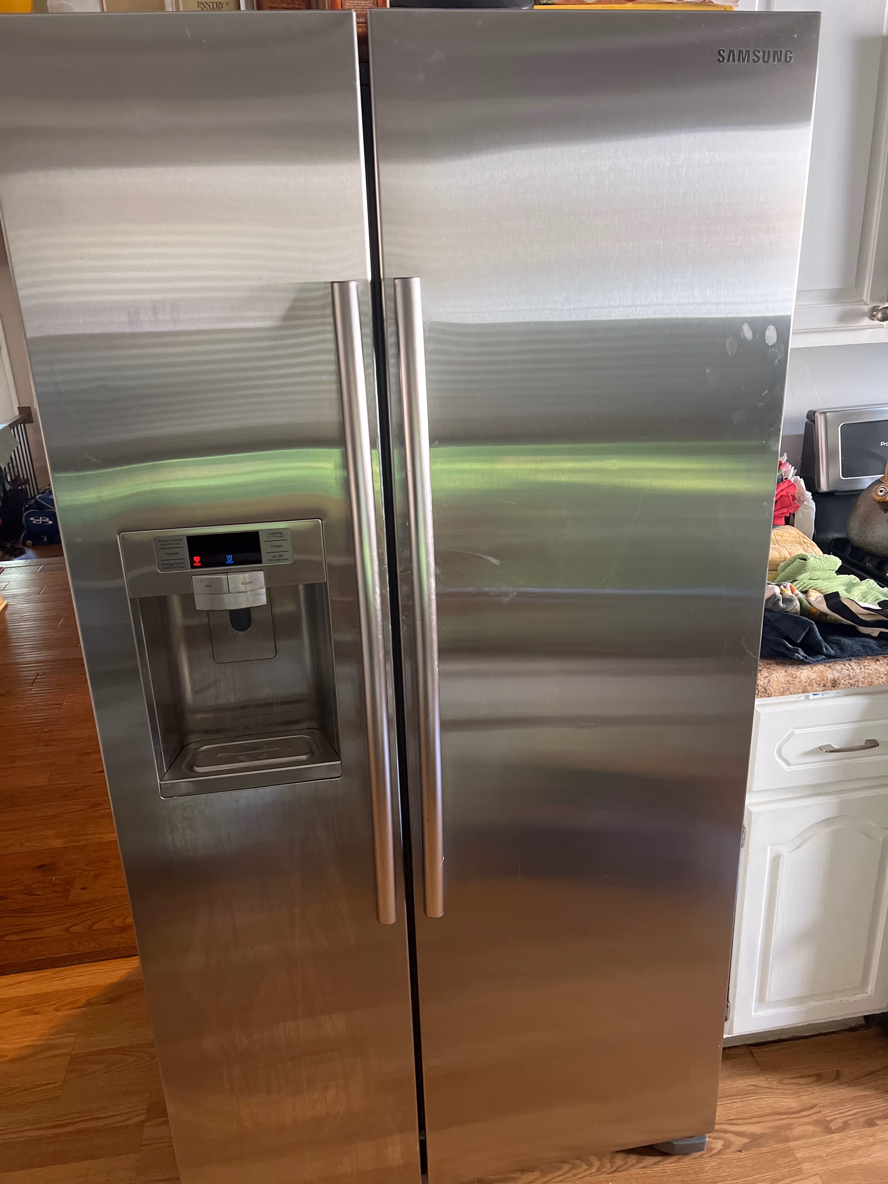 Featured Blog: A woman looking at a dishwasher