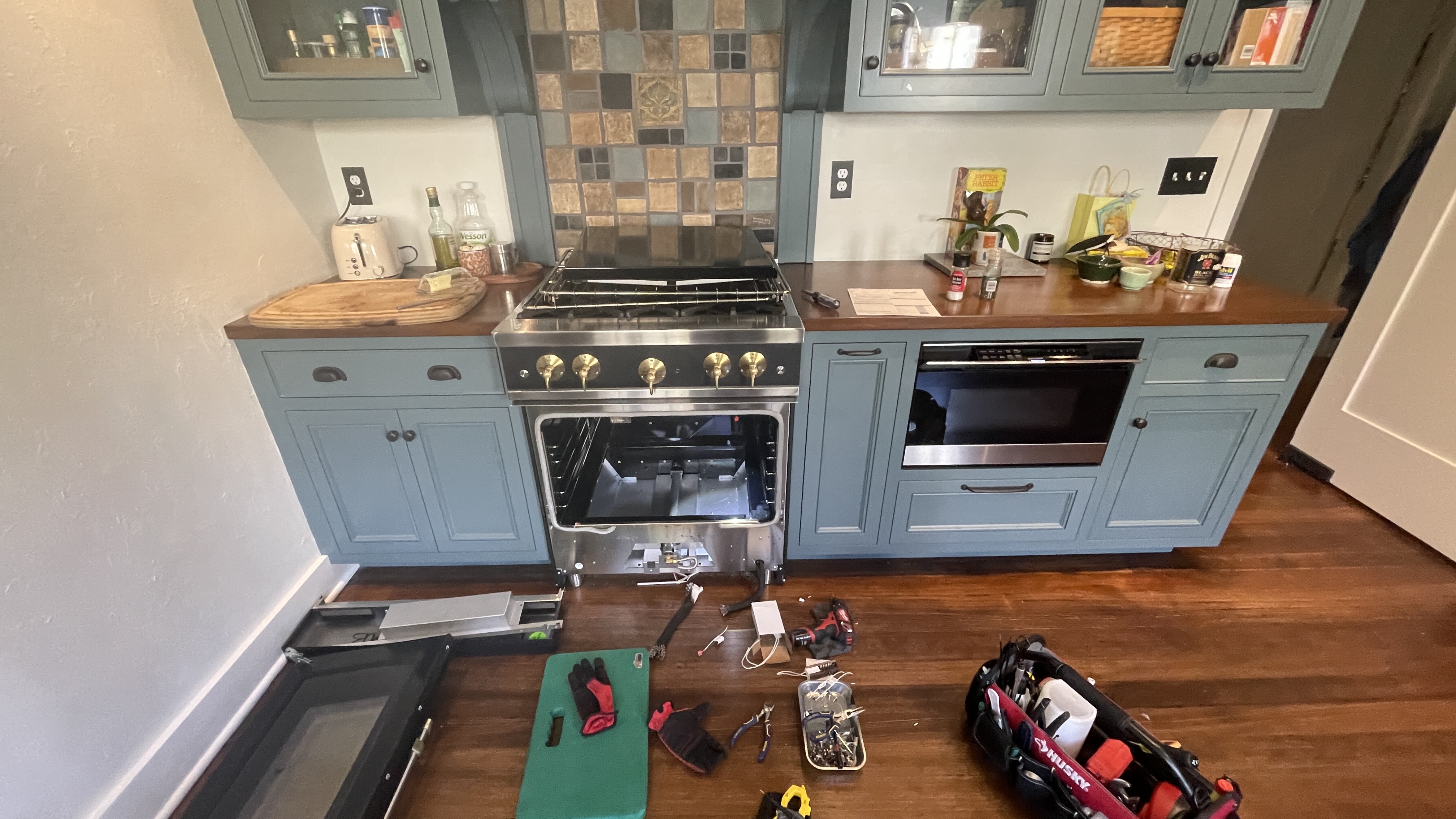 Featured Blog: A woman looking at a dishwasher