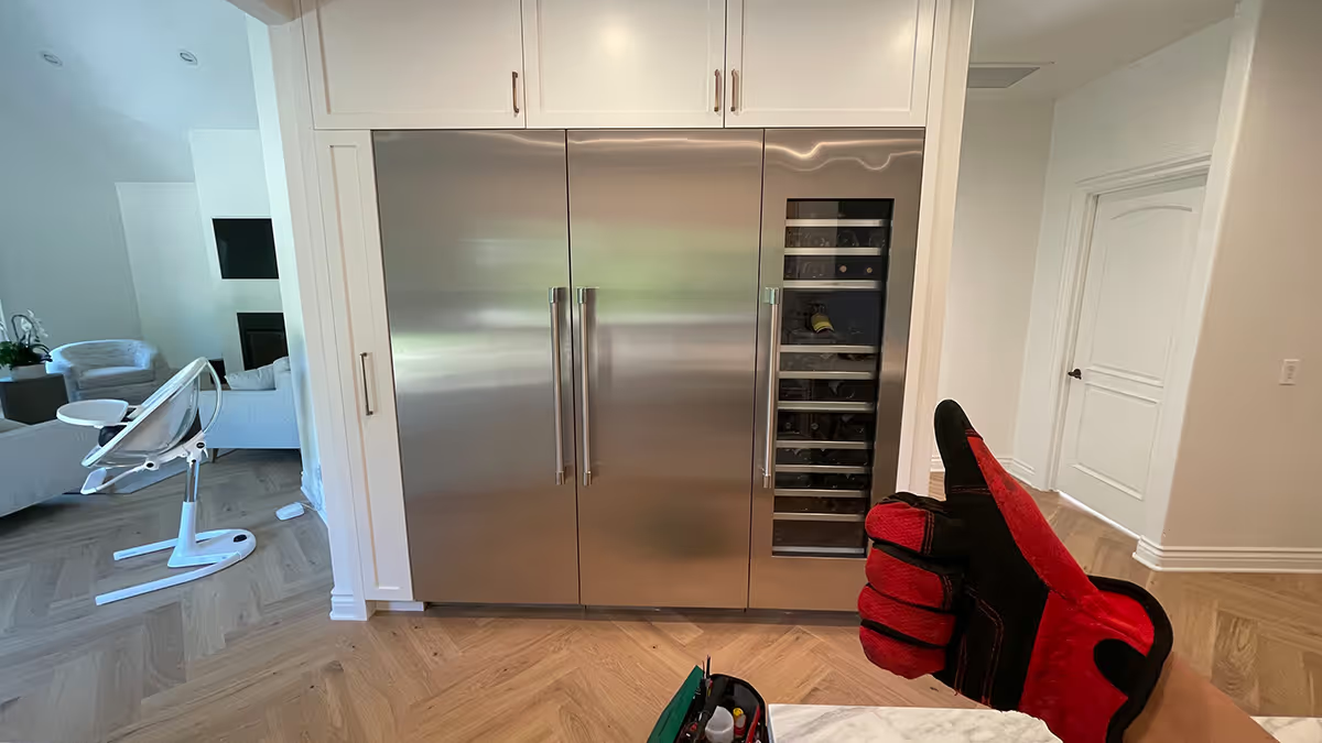 Featured Blog: A woman looking at a dishwasher