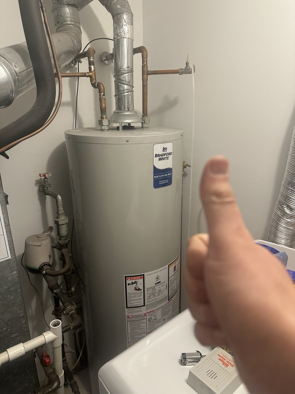Featured Blog: A woman looking at a dishwasher